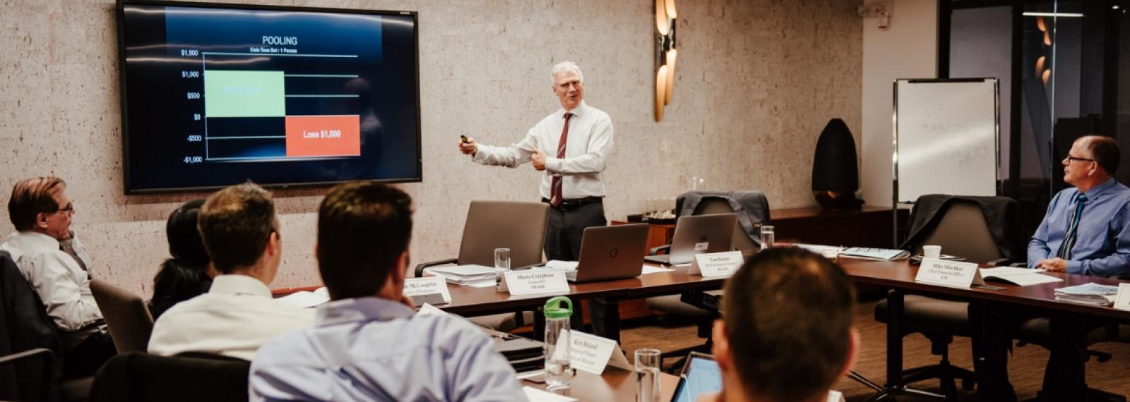 Man presenting to a small group