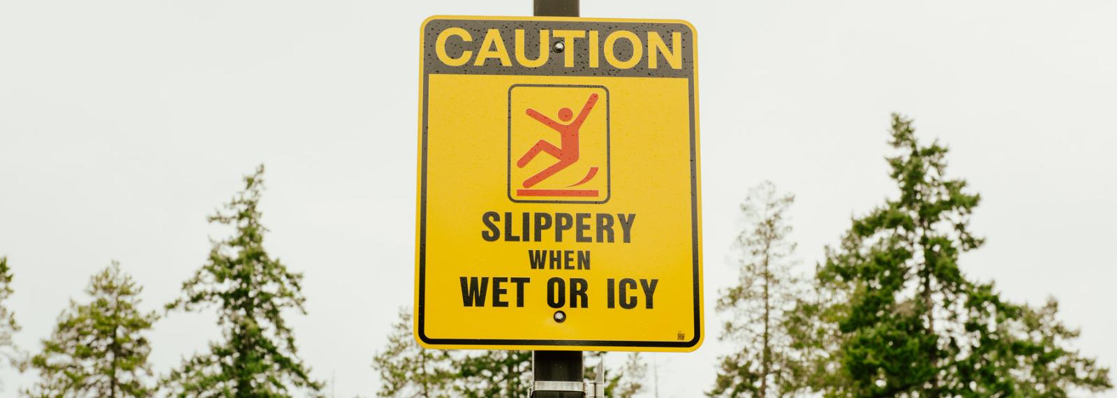 Slippery when wet or icy sign